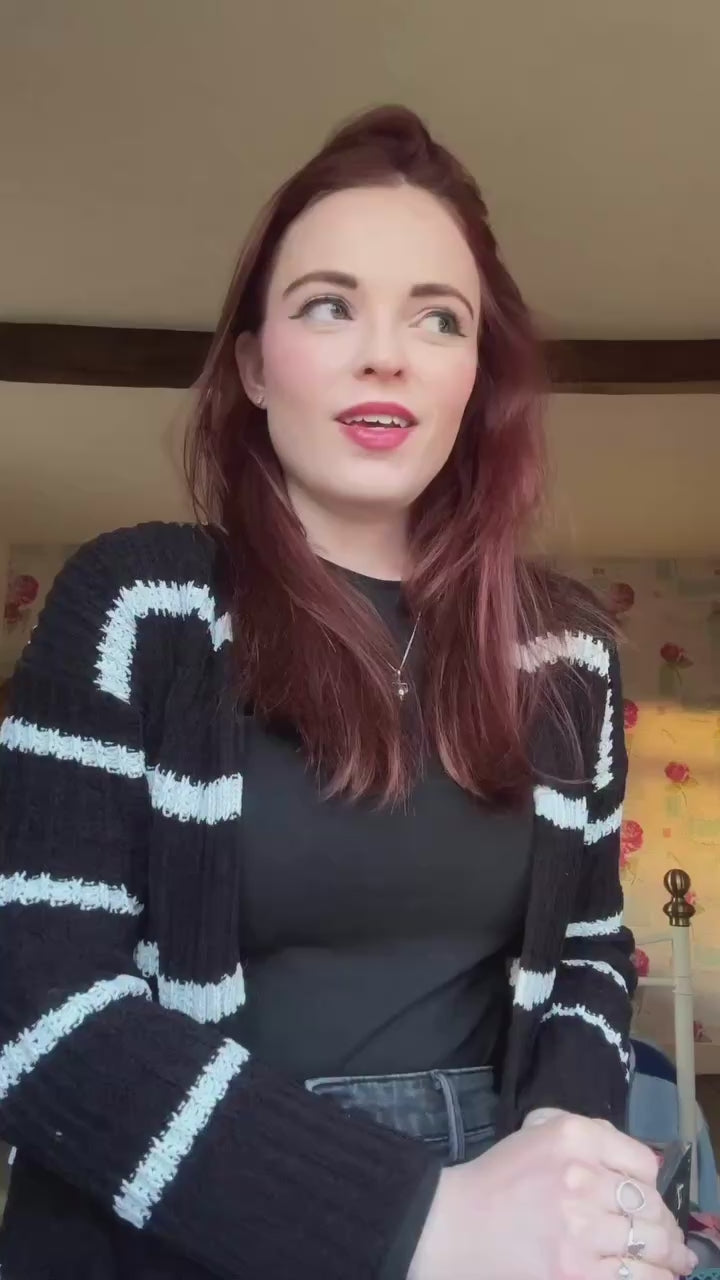 Load video: Ellie Littlechild showing her commission of her three dogs